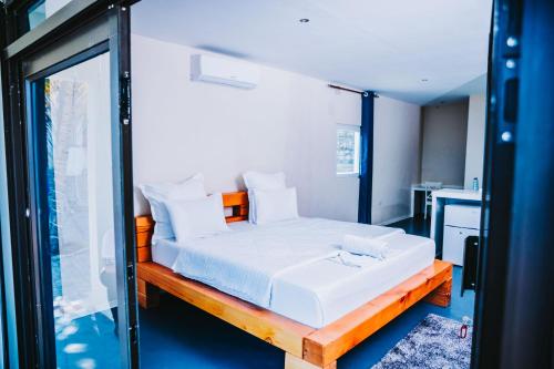 Katil atau katil-katil dalam bilik di SAVEE BEACH RESORTS