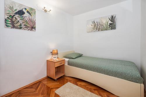 Posteľ alebo postele v izbe v ubytovaní Green Oasis
