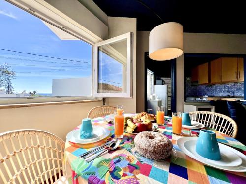 a table with a plate of food on it at Lagos Ocean Breeze 2 by Homing in Lagos