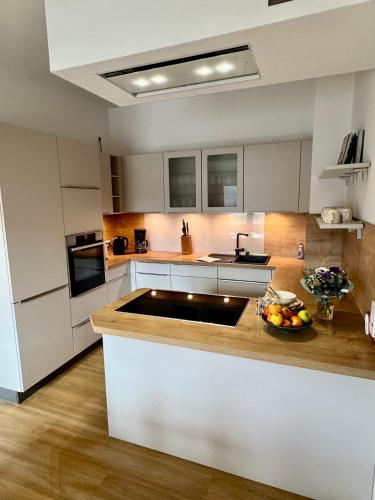 Η κουζίνα ή μικρή κουζίνα στο K4 Wohnung mit Gartenblick
