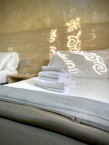 Ένα ή περισσότερα κρεβάτια σε δωμάτιο στο Hotel Colombo