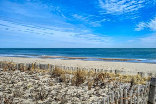 a beach with a fence and the ocean at Town of Bethany Beach -116 Oakwood St in Bethany Beach
