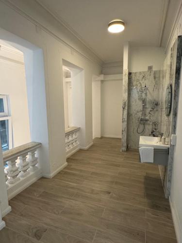 a bathroom with a sink and a mirror at Notorious Design Apartments - near Kärntner Straße in Vienna