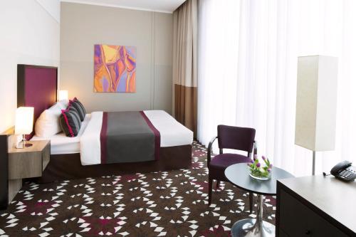Cama o camas de una habitación en Mercure Hotel MOA Berlin