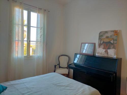Postel nebo postele na pokoji v ubytování L'Essentiel à Nice