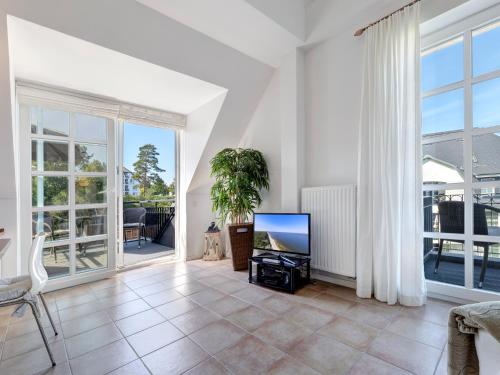 TV a/nebo společenská místnost v ubytování Residenz am Balmer See - BS 25 mit Wellnessbereich