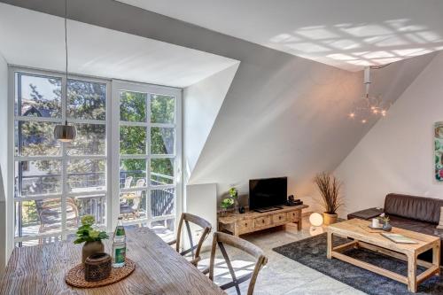 TV a/nebo společenská místnost v ubytování Residenz am Balmer See -BS 30 mit Wellnessbereich