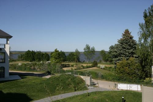 a view of a garden from a house at Residenz am Balmer See - BS 11 mit Wellnessbereich in Balm
