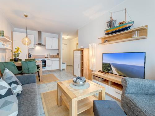 Μια τηλεόραση ή/και κέντρο ψυχαγωγίας στο Residenz am Balmer See - BS 40 mit Wellnessbereich