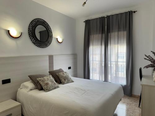 Postel nebo postele na pokoji v ubytování Hotel Ciudad Pozo Alcón