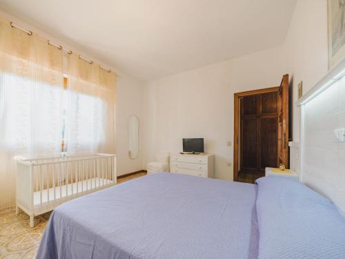 Ένα ή περισσότερα κρεβάτια σε δωμάτιο στο Holiday Home Mauro by Interhome