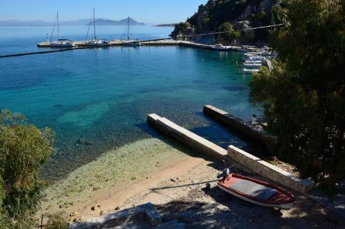 a small boat on the shore of a beach at Kimataki in Frikes