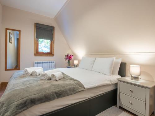 Katil atau katil-katil dalam bilik di Chalet Loch Lochy Retreat by Interhome