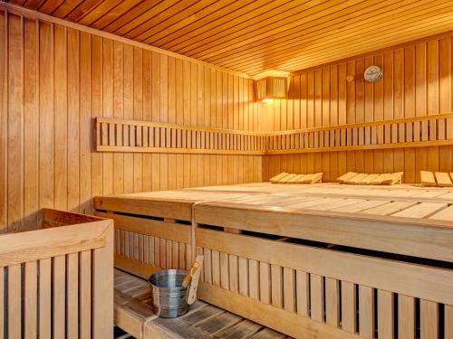 a wooden sauna with two beds in it at Ostseeresidenz Gorki- Park - 20 mit Wellness und Schwimmbad in Bansin