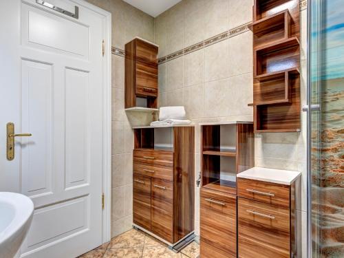 a bathroom with a shower and a sink at Villa Bellevue App. 8 in Ahlbeck
