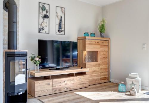 TV a/nebo společenská místnost v ubytování Haus Sternstunden