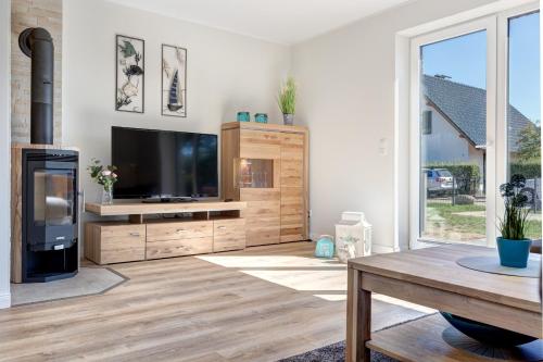 TV a/nebo společenská místnost v ubytování Haus Sternstunden