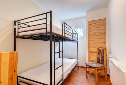 Postel nebo postele na pokoji v ubytování Ferienhaus Brakkelmann (Birkenhain)