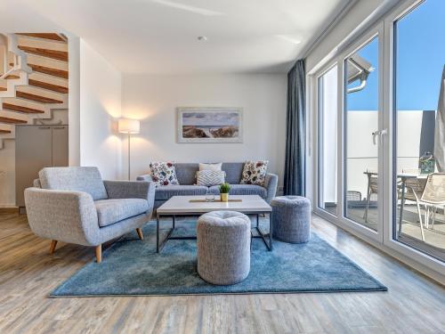 Posezení v ubytování Bernsteinquartier BQ 09a - Ferienhaus Meeresrauschen