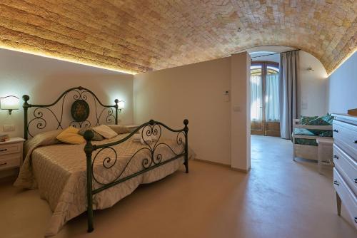 Una cama o camas en una habitación de Poggio Romita