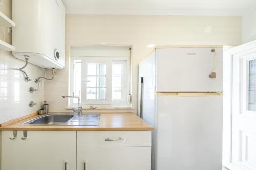 Dapur atau dapur kecil di Assenta Beach House - T2