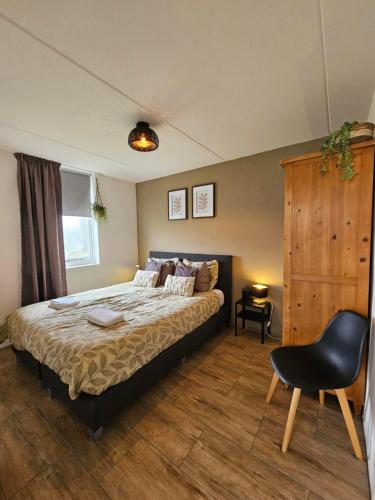 Postel nebo postele na pokoji v ubytování Ostrea 12 Roompot Beach Resort Kamperland