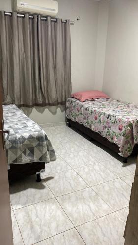 Ένα ή περισσότερα κρεβάτια σε δωμάτιο στο Apartamento