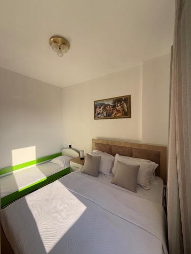 Llit o llits en una habitació de Troy's Beachside Escape
