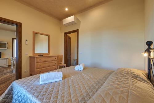 Una cama o camas en una habitación de Poggio Romita