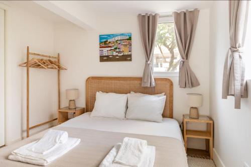 En eller flere senge i et værelse på Villa Margaritta