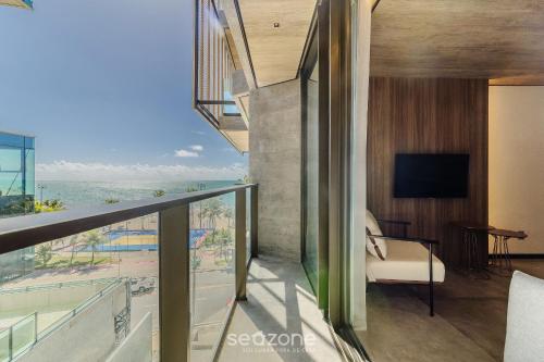 TV/trung tâm giải trí tại NWTs - Estúdios com Vista Lateral Mar em Maceió II