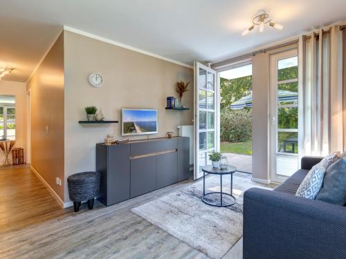 TV a/nebo společenská místnost v ubytování Residenz am Balmer See - BS 06 mit Wellnessbereich
