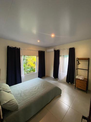 Postel nebo postele na pokoji v ubytování Casa El Rio