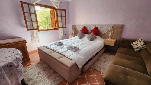 Postel nebo postele na pokoji v ubytování Appartement Riad 5min à pied de l'aéroport