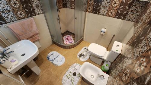 Koupelna v ubytování Appartement Riad 5min à pied de l'aéroport