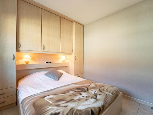 En eller flere senge i et værelse på Apartment Green Garden-13 by Interhome