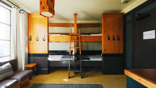 a room with two bunk beds and a couch at Freehand Los Angeles in Los Angeles