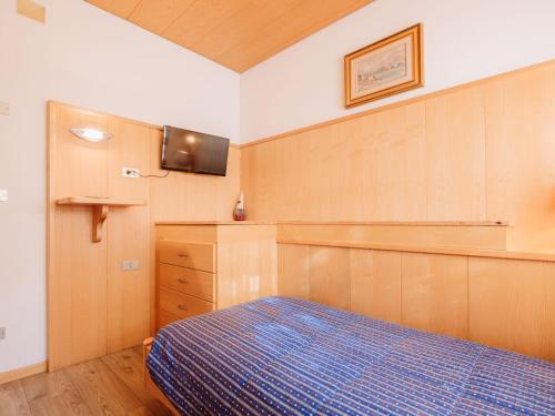Ένα ή περισσότερα κρεβάτια σε δωμάτιο στο Apartment Garni Eden by Interhome