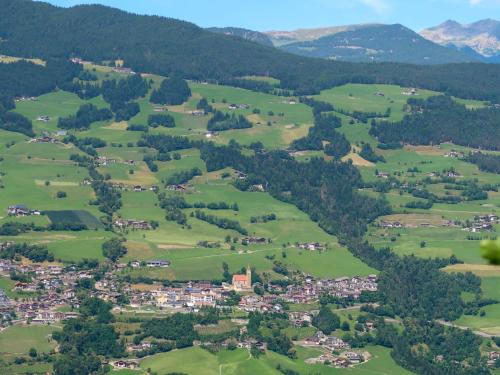 an aerial view of a village in the mountains at Apartment Residence Egger - n-301 by Interhome in Villandro