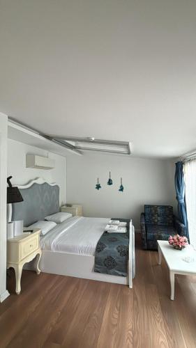 Кровать или кровати в номере Urla Marin otel