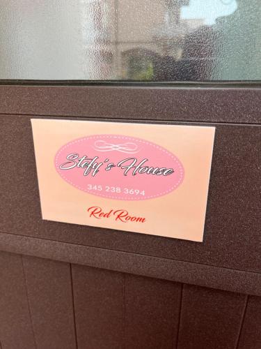 a sign on top of a counter in a bathroom at Stefy's House in Scalea