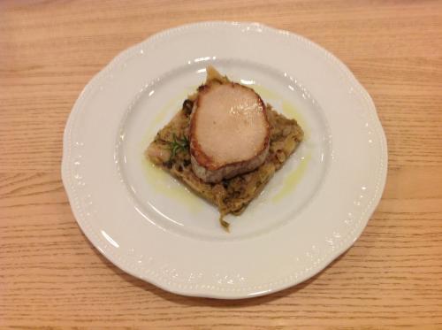 a white plate with a piece of food on it at Domus Australia in Rome