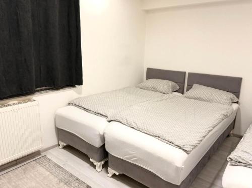 Ένα ή περισσότερα κρεβάτια σε δωμάτιο στο Apartment Azra
