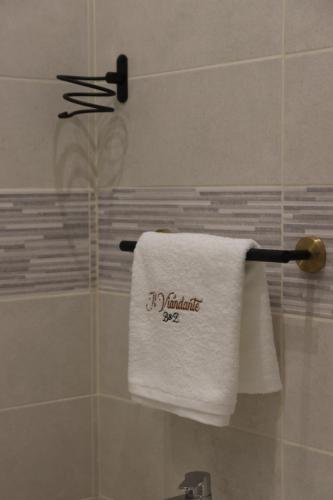 a towel hanging on a towel rack in a bathroom at Il Viandante Bed & Breakfast in Roseto Valfortore
