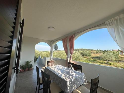 Beachfront Olive Retreat - Your Escape to Peace