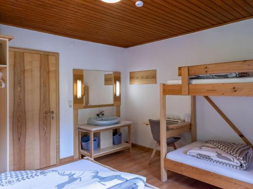 Ένα ή περισσότερα κρεβάτια σε δωμάτιο στο Holiday Home Alpenchalet Silbertal by Interhome