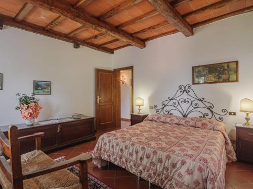 Ένα ή περισσότερα κρεβάτια σε δωμάτιο στο Holiday Home La Quercia by Interhome