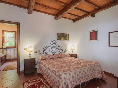 Ένα ή περισσότερα κρεβάτια σε δωμάτιο στο Holiday Home La Quercia by Interhome