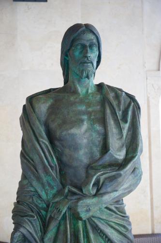 a statue of a man in a robe at Domus Australia in Rome