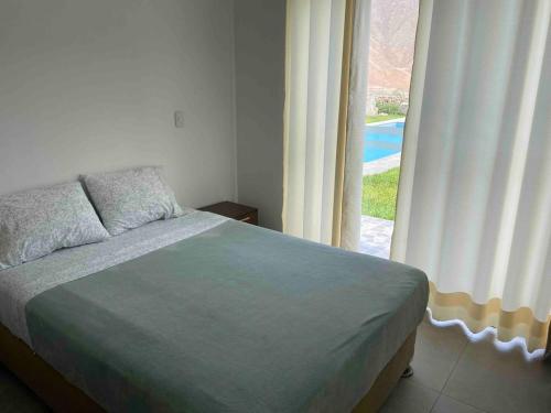 Postel nebo postele na pokoji v ubytování Casa de Campo en Cieneguilla